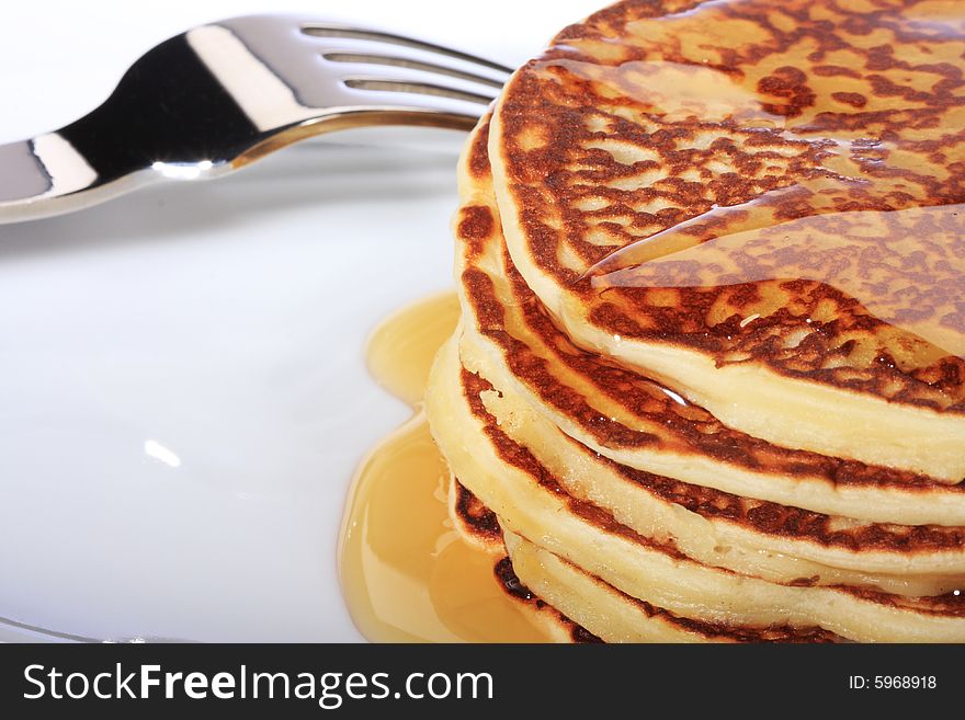 Pile of american pancakes with syrup. Pile of american pancakes with syrup