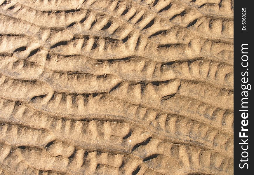 Pattern in sand  fading into he distance. Pattern in sand  fading into he distance