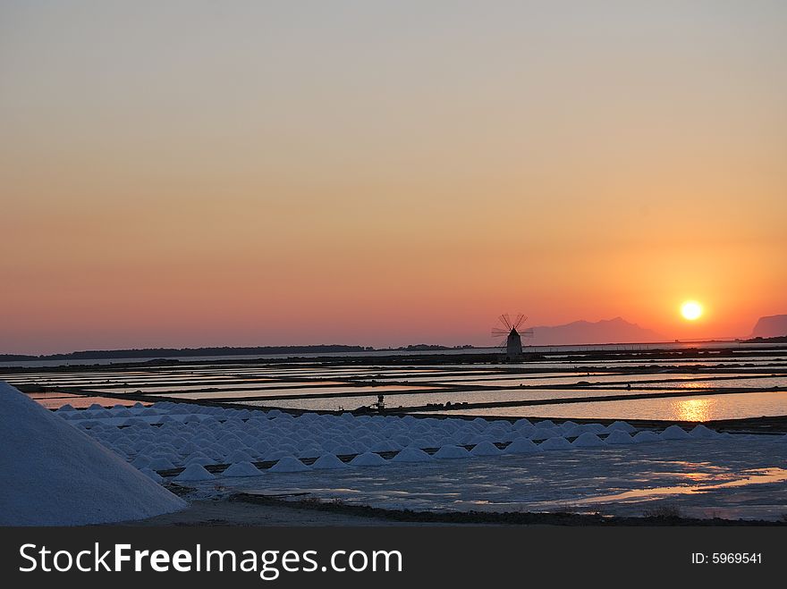 Sunset on salt-works of Marsala in SIcily