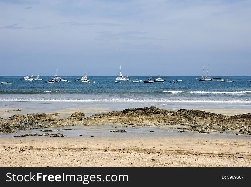 Boats and Sailboats on Blue Water