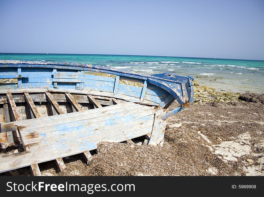 Shipwreck on a seashore in Africa, Tunisia.