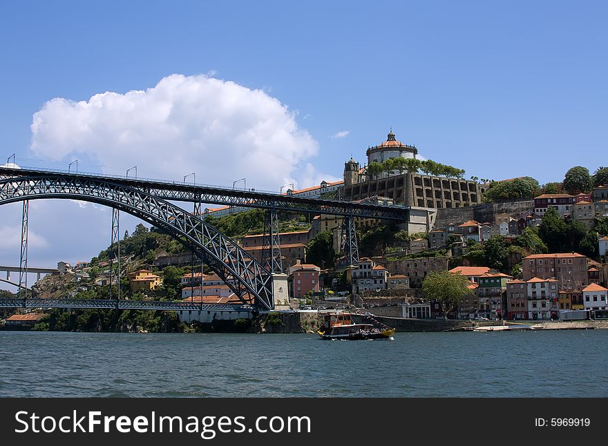 Antique fortress with bridge in Porto over blue sky. Antique fortress with bridge in Porto over blue sky