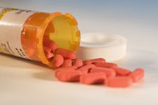 Spilled Bottle Of Red Pills Royalty Free Stock Photo Spilled Bottle Of Red Pills Royalty Free Stock Photo