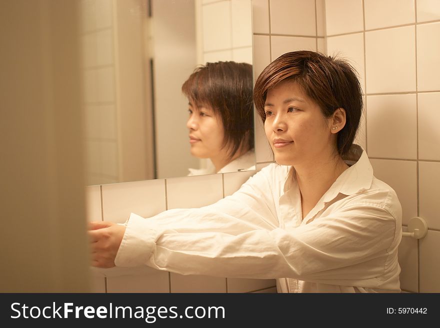 A girl in casual dress, taken at home. A girl in casual dress, taken at home.