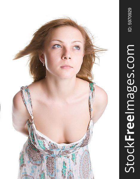 Girl with hair fluttering on a wind isolated on a white background