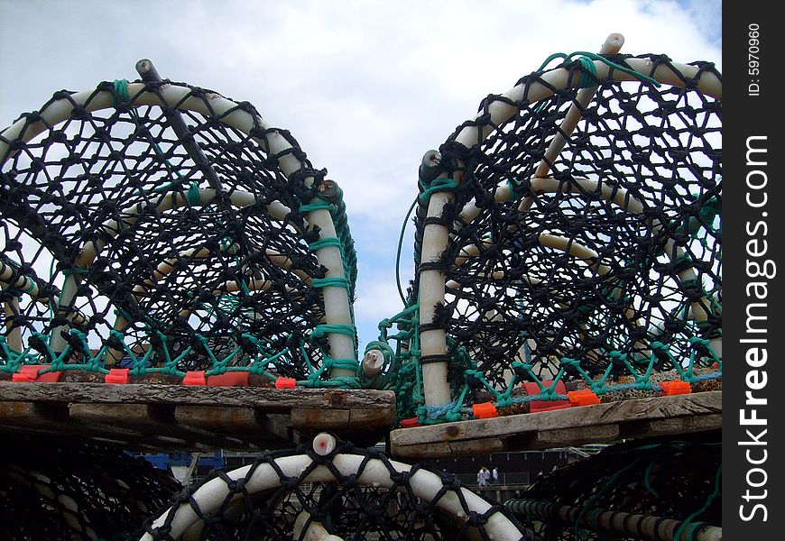 Details of lobster pots in harbor.