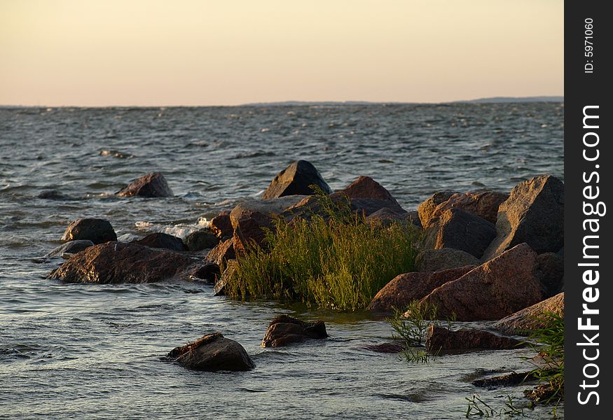 Rocks in the sea in twilight. Rocks in the sea in twilight