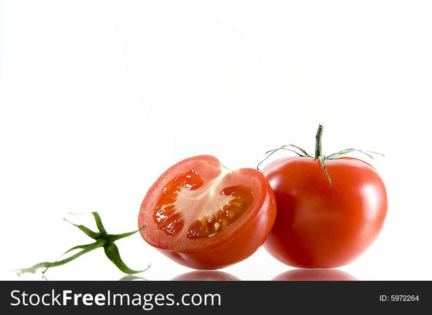 View of nice big red tomatoes  on white background. View of nice big red tomatoes  on white background