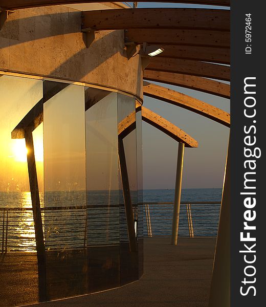 A wonderful photo of the dock of Lido di Camaiore at the sunset hour