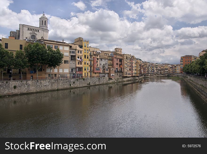 Gerona and river - water sky and buildings