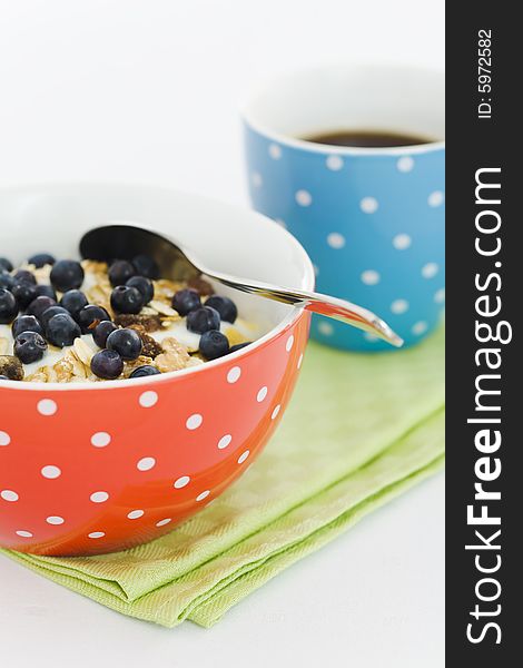 Breakfast yoghurt with blueberries and coffee. Breakfast yoghurt with blueberries and coffee