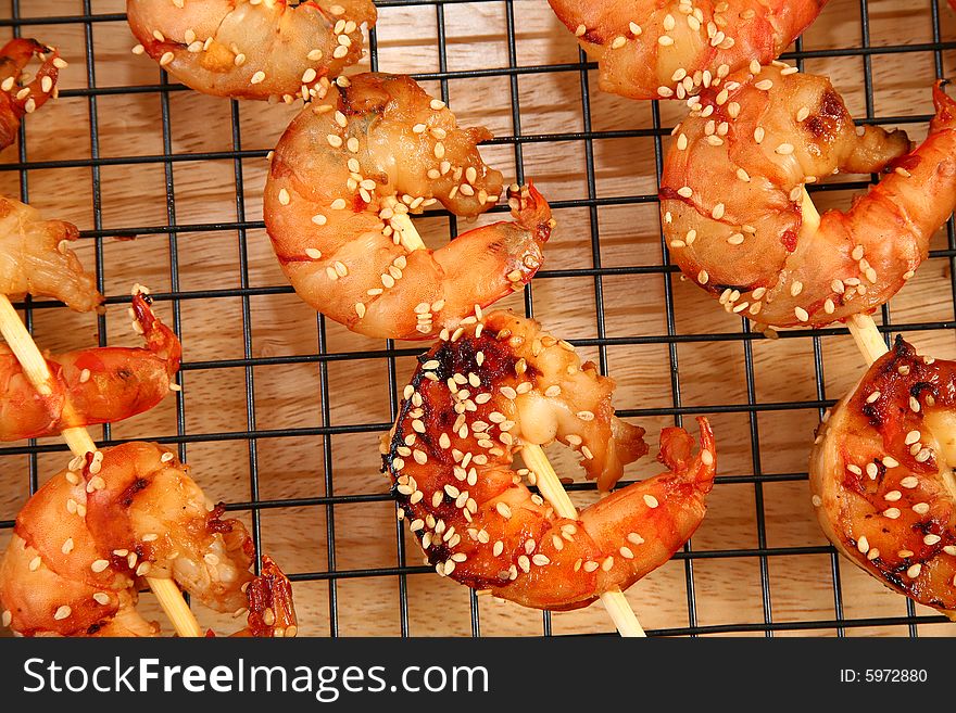 Ginger Teriyaki Shrimp Kebabs in kitchen or restaurant.