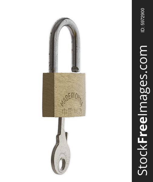 Small Brass Padlock With Key Inserted