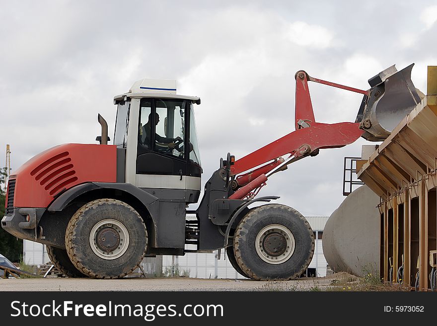 Big red bulldozer at work