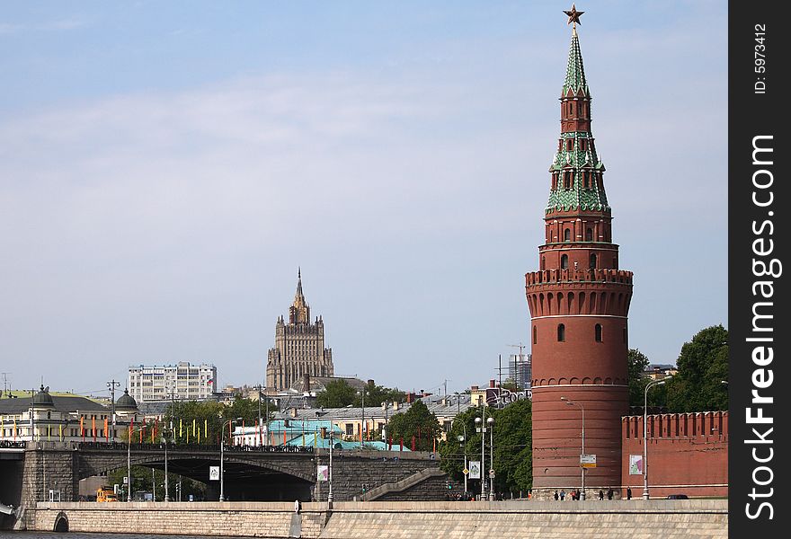 View on Kremlin quay and Bolshoi Kamenny bridge from Sofiyskaya quay. Stalin skyscraper in background.