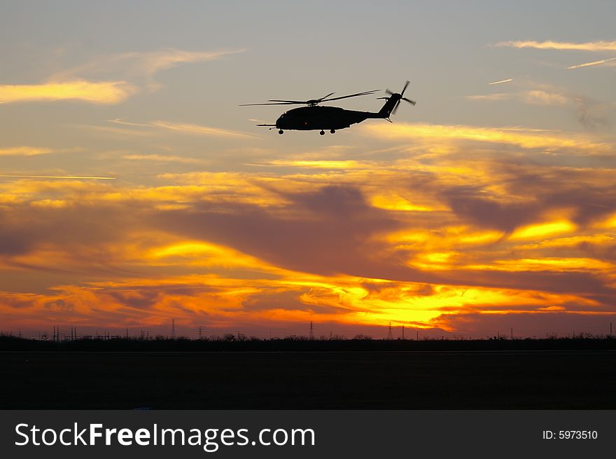 CH-53E Sea Dragon Landing at Sunset. CH-53E Sea Dragon Landing at Sunset