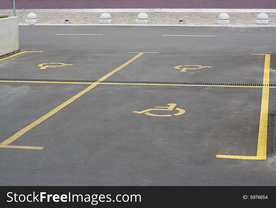 Yellow parking sign for handicapped people. Yellow parking sign for handicapped people