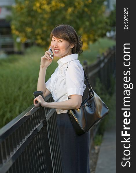 Woman Talking on Cell Phone - vertical