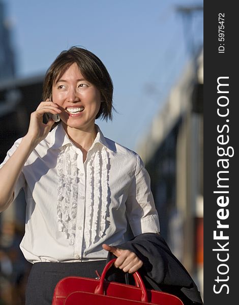 Woman Talking on a Cell phone - Vertictal