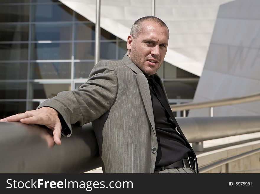 Handsome  Male Model Posing outdoors, downtown. Handsome  Male Model Posing outdoors, downtown