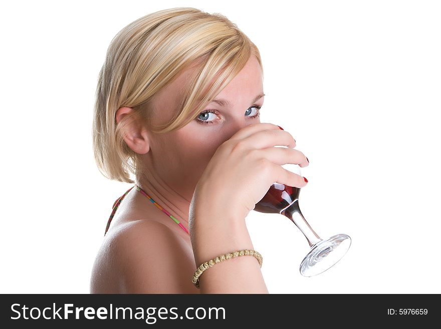 Young nice woman drinks wine from a glass isolated on a white background. Young nice woman drinks wine from a glass isolated on a white background