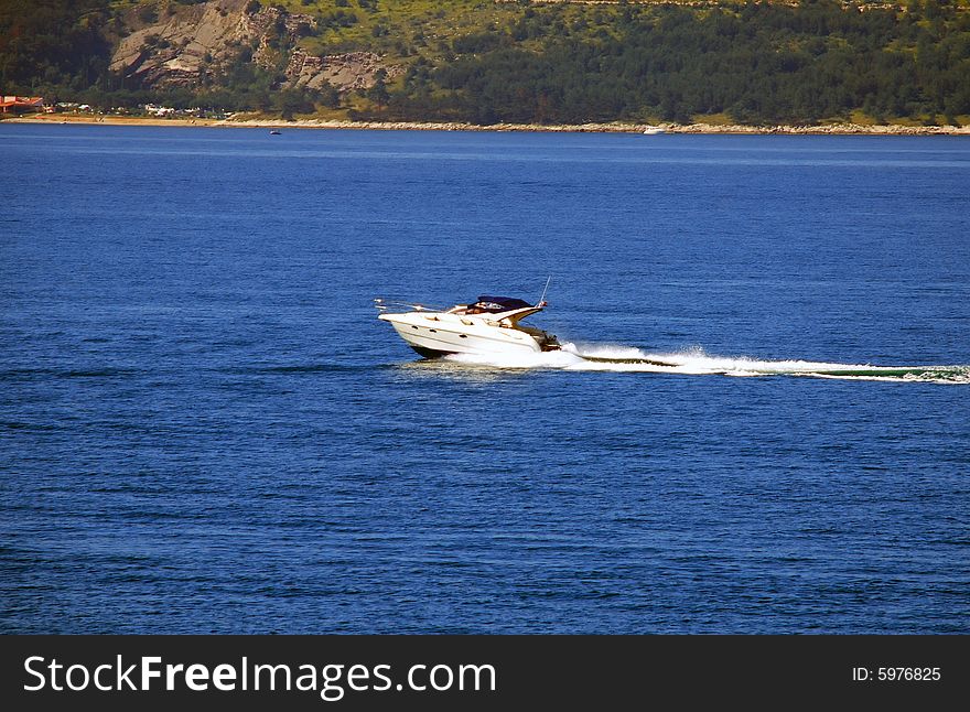 Speed-boat Over Blue Sea