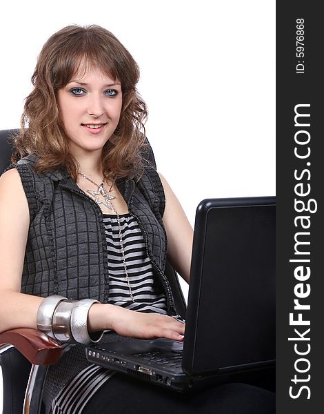 Pretty girl working on laptop, isolated on white