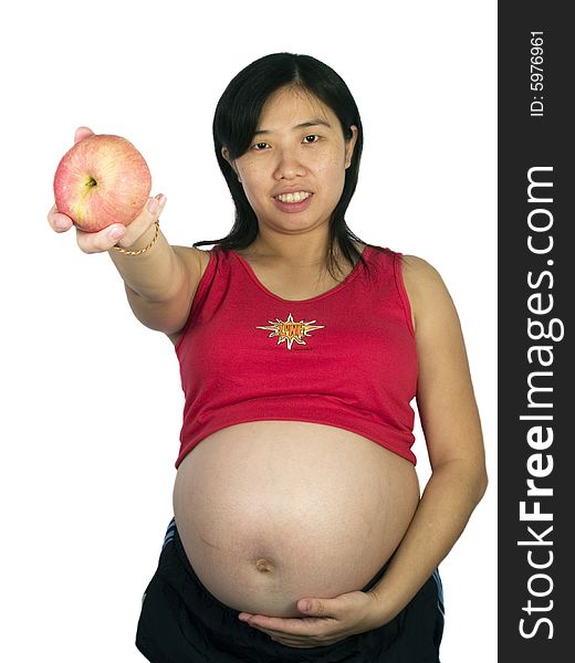 Young woman holding red apple with white background. Young woman holding red apple with white background