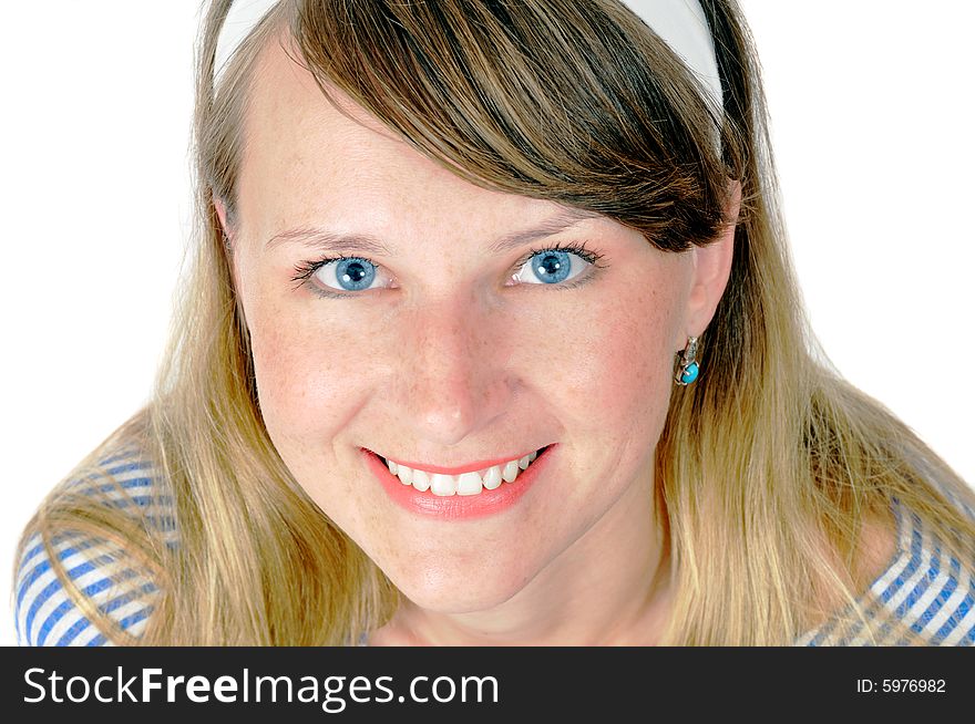 Portrait of beautiful smiling blue-eyed girl, isolated on white