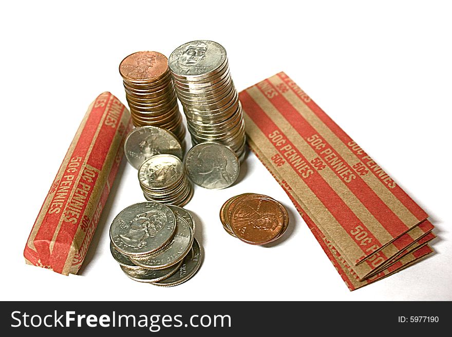 Loose change with penny rolls.