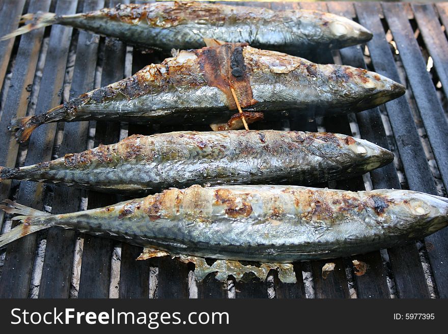 Baked fish on the grill