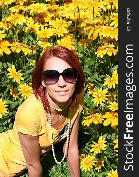 Funny redhead girl relaxing outdoors. Funny redhead girl relaxing outdoors