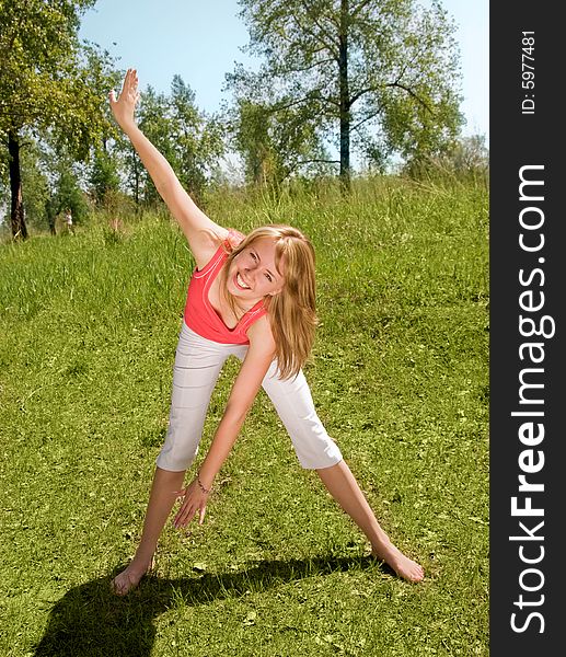 Young Girl Works Out In The Park