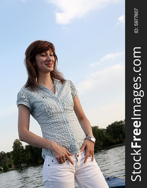 Girl standing on a boat