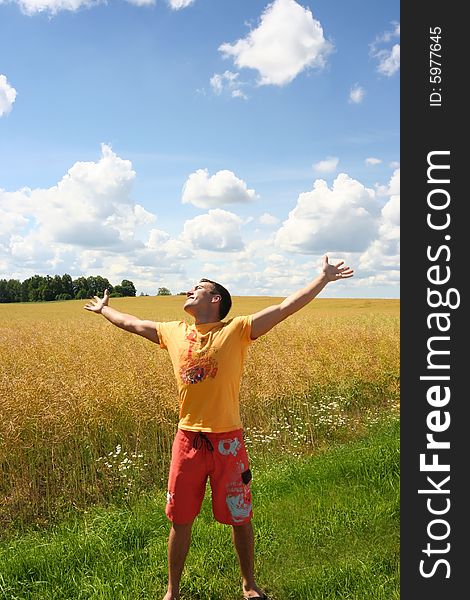 Cute young guy relaxing outdoors. Cute young guy relaxing outdoors