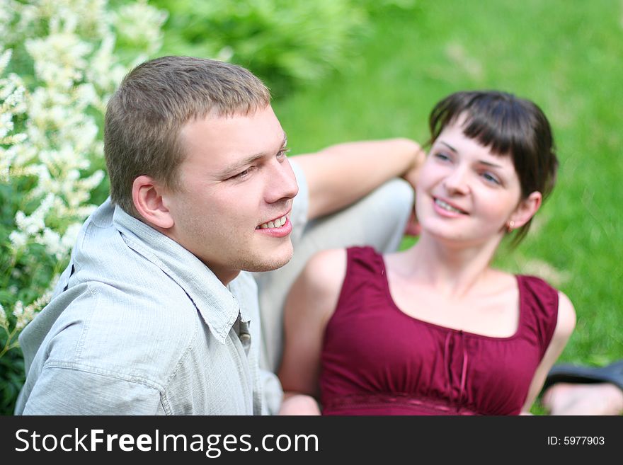 Happy young loving couple outdoors. Happy young loving couple outdoors