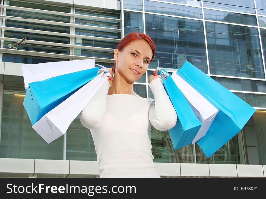 Young woman with shopping bags. Young woman with shopping bags