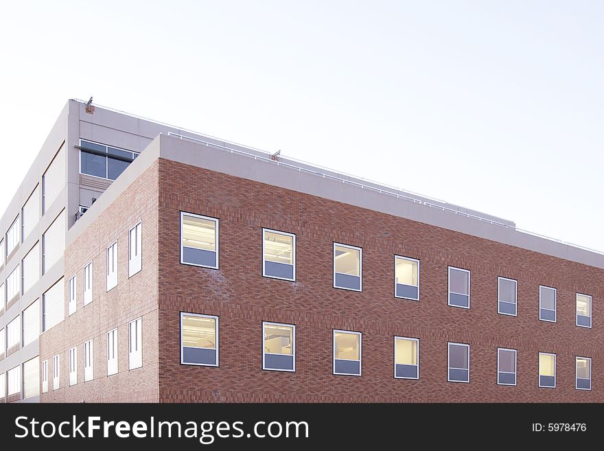 An office building with a empty parking lot