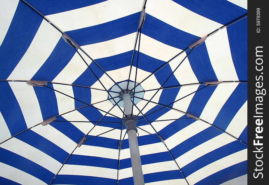 A beautiful shot of the interior of a beach umbrella. A beautiful shot of the interior of a beach umbrella