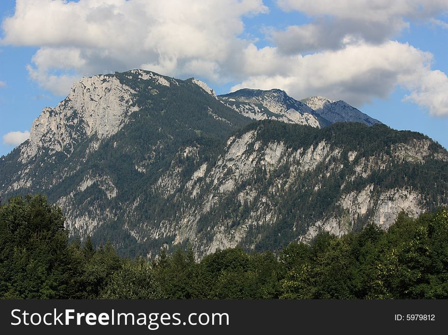 The alps in austria with cloudy sky near kufstein. The alps in austria with cloudy sky near kufstein
