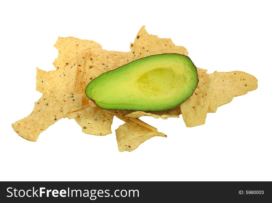 Avocado laying of taco chips, ready for a guacamole recipe. Avocado laying of taco chips, ready for a guacamole recipe