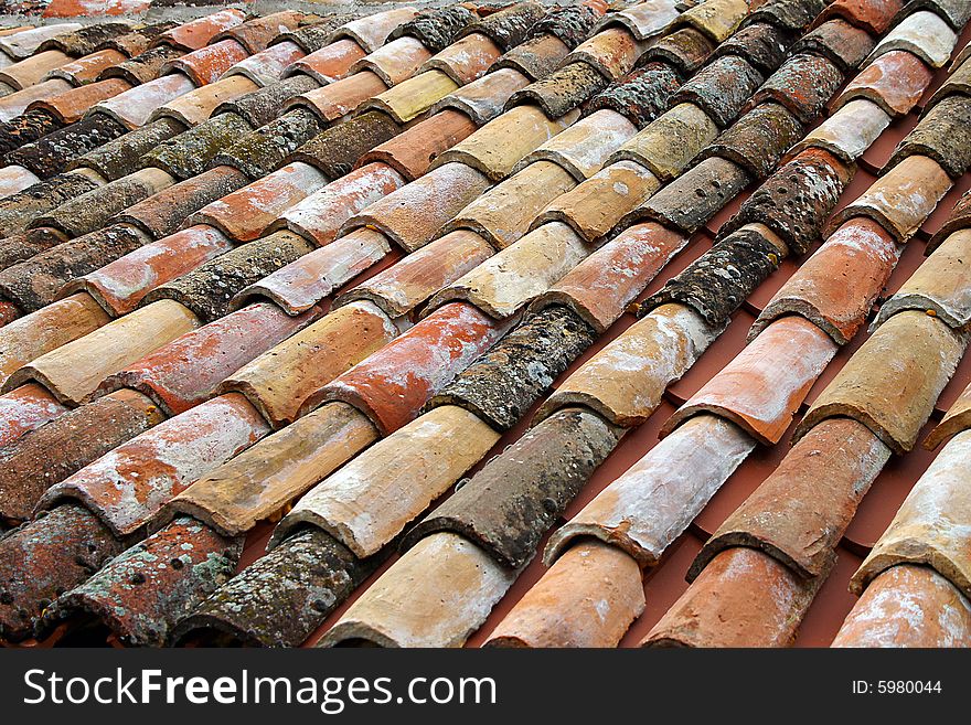 On a photo close up of a tile roof