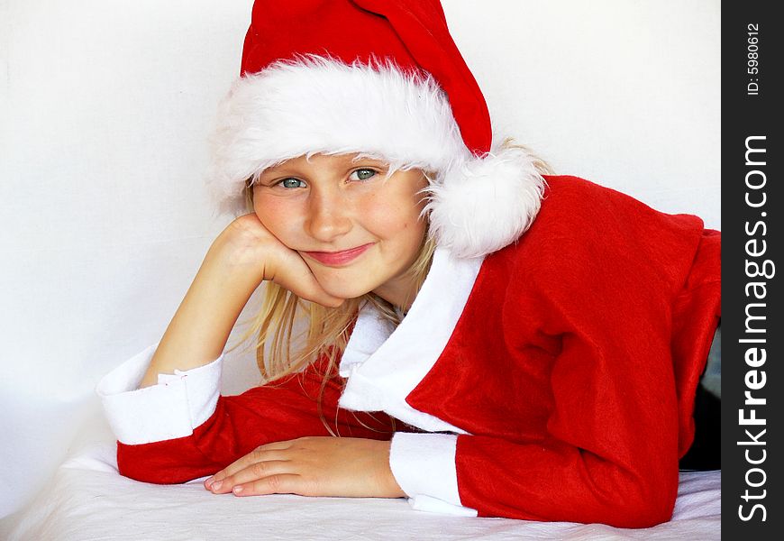Smiling girl in santa hat