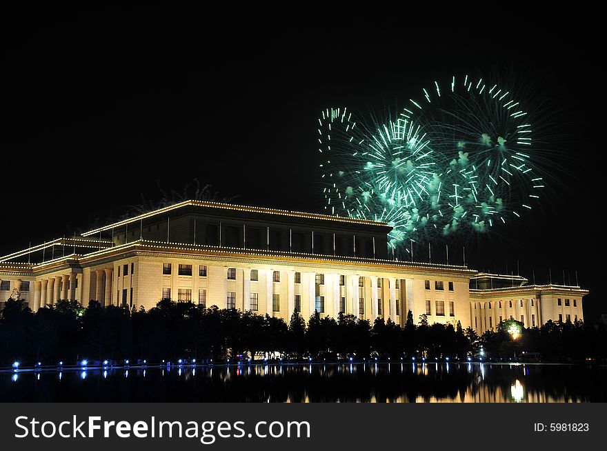 Fireworks over building, night scene