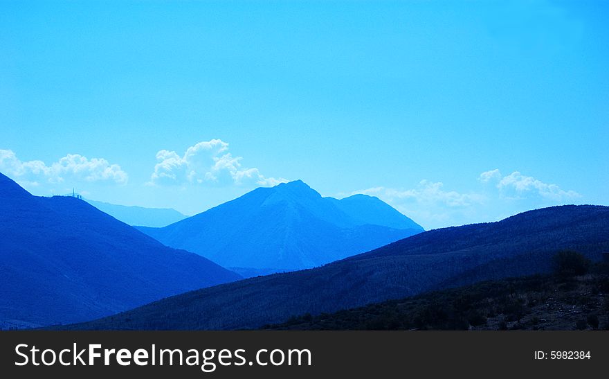 Blue mountains background with blue sky. Blue mountains background with blue sky