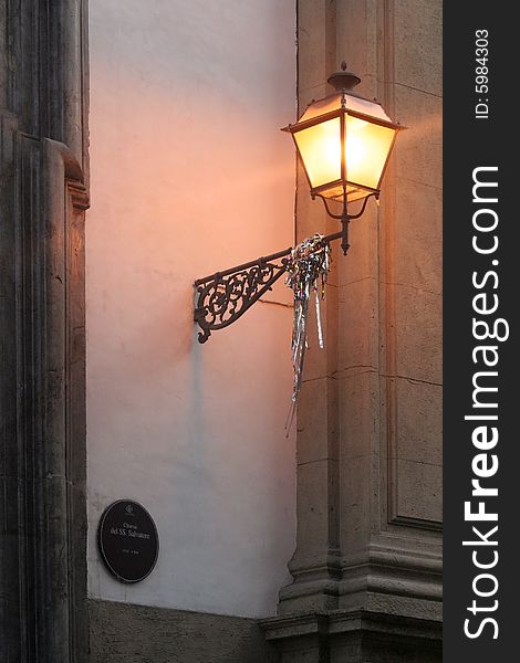 Streetlight switched on in Palermo, Sicily