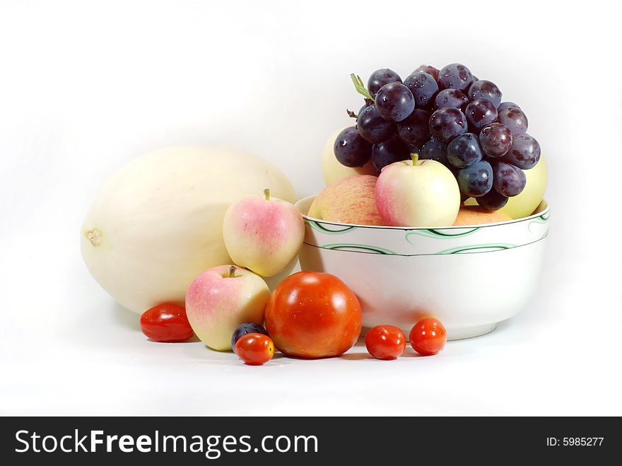 Apples,grapes and tomato  on white background. Apples,grapes and tomato  on white background