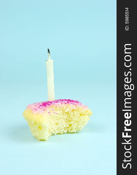 Cup cakes isolated against a blue background