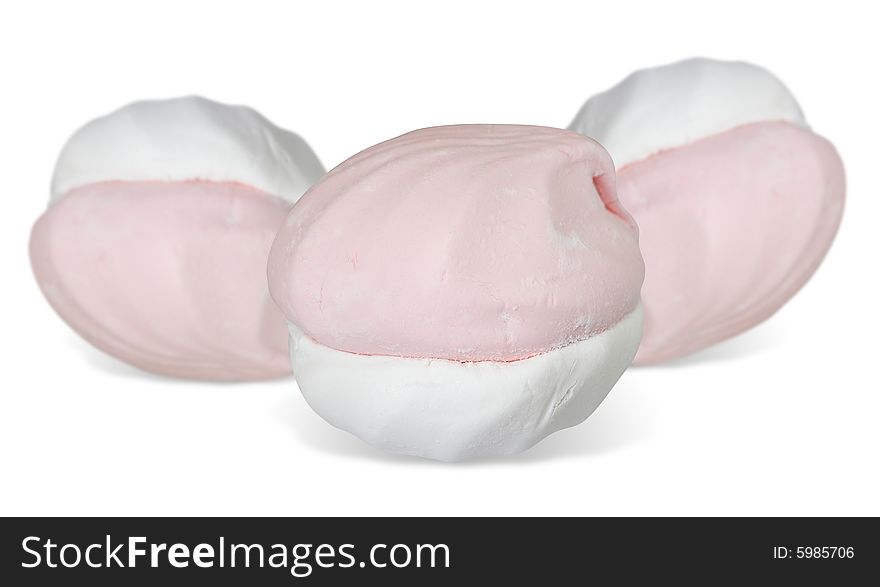 Three pink-white zephyr cakes with shadow isolated over white.