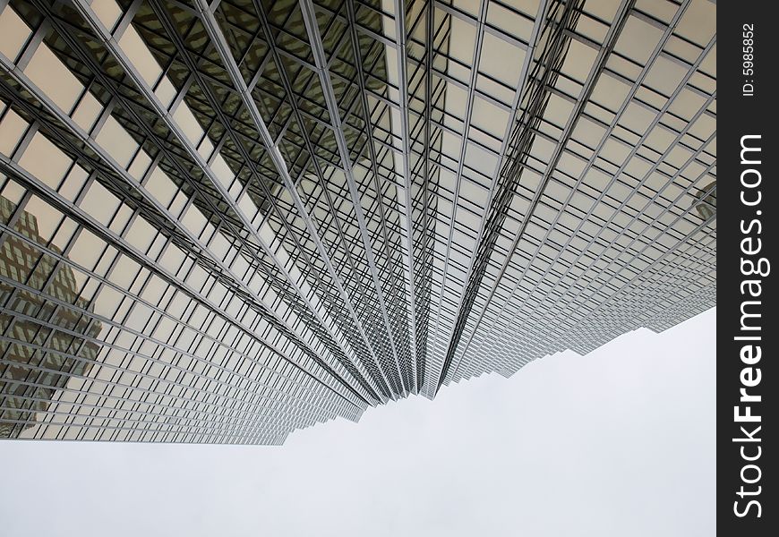 Looking up at the windows of a skyscraper. Looking up at the windows of a skyscraper.